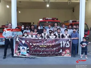 ادای احترام نوجوانان بسیجی قم به کارکنان آتش نشانی