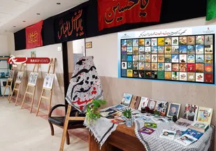 نمایشگاه "عکس و کتاب دفاع مقدس" در اداره فرهنگ وارشاد اسلامی  شهرستان آران و بیدگل برگزارشد.