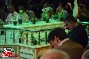 مزار شهید گمنام متبرک به عطر پرچم حرم رضوی