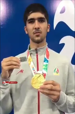 اهدا مدال طلای تکواندو به سردار شهید حسین غنیمت پور+ عکس