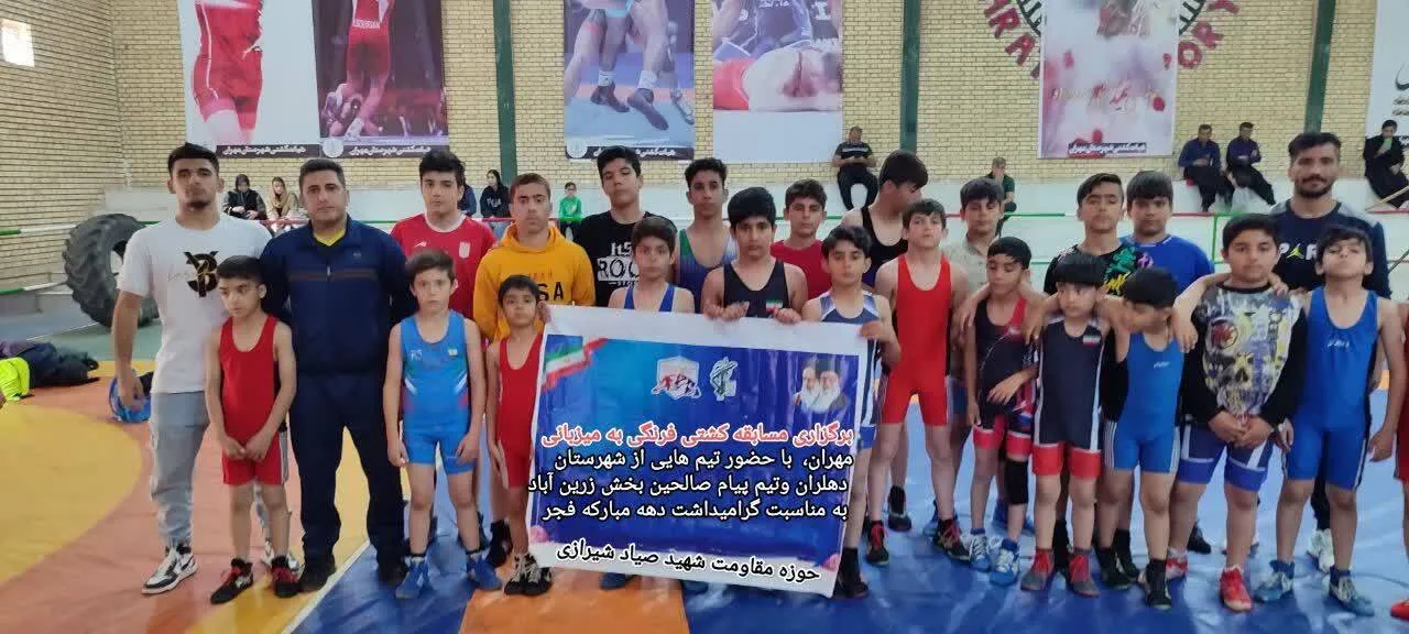 قهرمانی کشتی گیران بسیجی حوزه زرین آباد در مسابقات کشتی در مهران